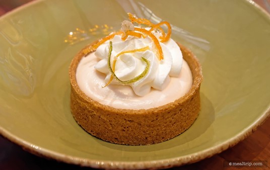 The Paloma Tart features grapefruit and lime mousse, Avion Blanco Tequila, lime whipped cream, Graham cracker crust, and candied citrus zest.