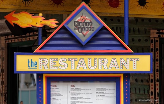 The House of Blues logo above an exterior menu board.