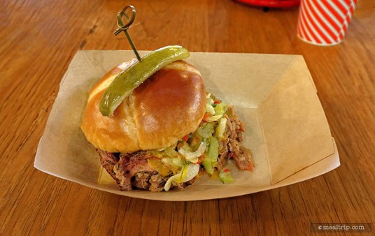The Southern Pig                is one of the sandwiches on The Polite Pig menu. It features Pulled Pork, Fennel-apple Slaw, tangy Mustard BBQ and Duke's Mayo served with a Pickle Spear. The sandwiches do not come with "sides", those are extra.