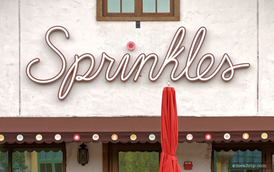 The Sprinkles sign above the entrance to Sprinkles at Disney Springs.