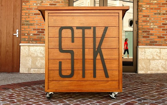 The outdoor host/check-in station at STK.