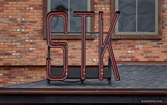 Sign above STK's main entrance.