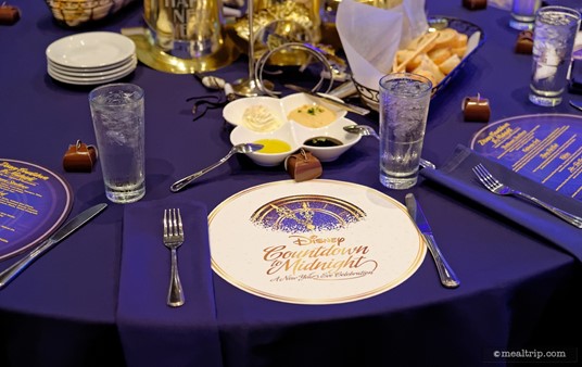 Each table of 10 (or more) was numbered but there are no "assigned" seats per-say. You can just pick a spot. Each place setting had this great printed circle, which when flipped over, listed all the menu items and wine pairings that were available!