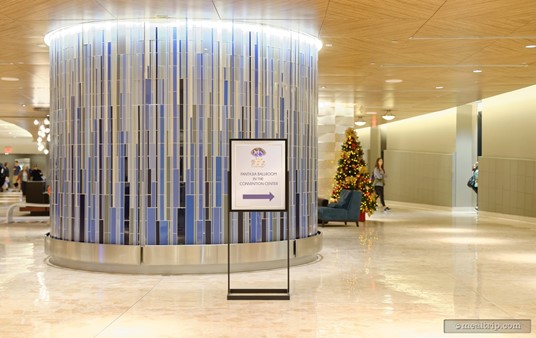 If you're in the lobby of the main Contemporary Resort building, look for a sign like this, which will point you to the Fantasisa Ballroom.