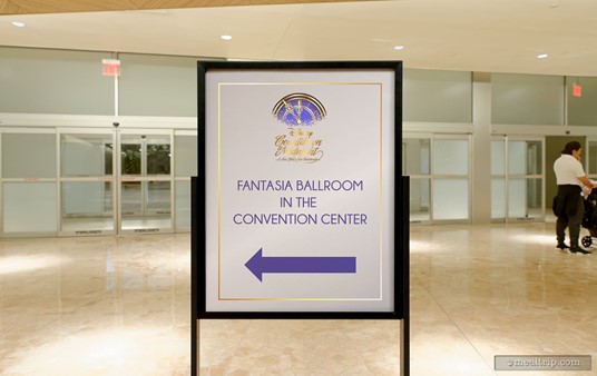 Keep following the arrows to find the event check-in area. This sign is located in the main Contemporary Resort Lobby.