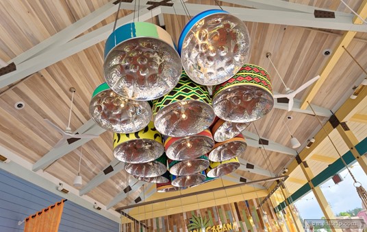 Looking up at the Banana Cabana Pool Bar will reveal a steel drum feature hanging from the ceiling.