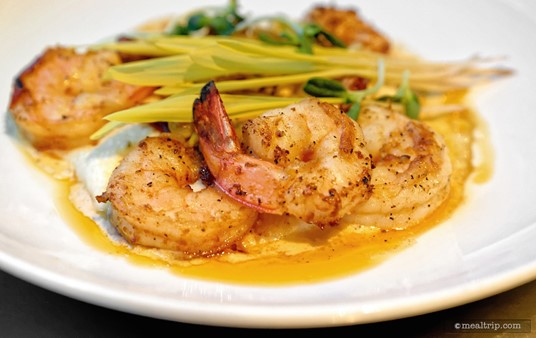 The Coral Reef's version of Shrimp and Grits included five Sauteed Shrimp that are plated on top of Cheddar Grits.