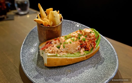 The Maine Lobster Roll is one of the more expensive "main plates" on the Ale and Compass lunch menu, but it's chocked full of lobster sitting in a house-made New England-style roll.