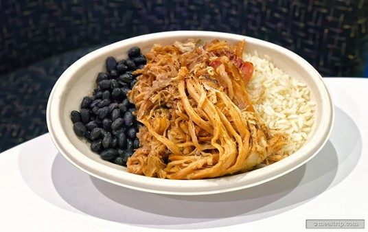 On the official SeaWorld menu for Waterway Grill, this entrée is called "Slow Roasted Pork" and it's said to be Marinated in Tropical Juices and topped with Sauté Onions. All of the entrées on the day I visited were served with black beans and rice.