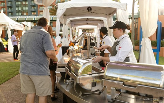 There are food and beverage stations on both sides of the main Causeway at the Swan and Dolphin Food and Wine Classic. (2018)