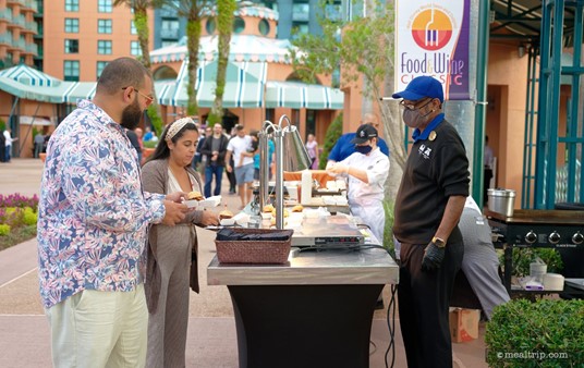 One of the main "causeway" food stations at the 2021 Swan and Dolphin Food and Wine Classic.