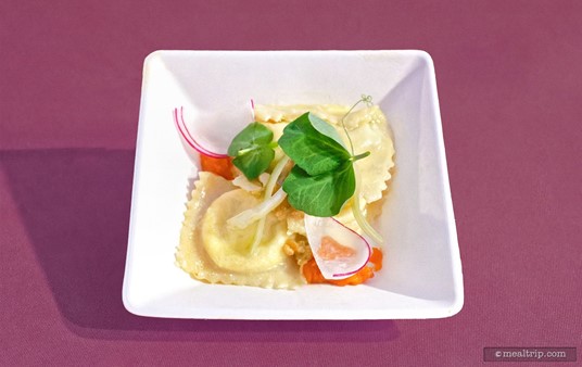 House Made Ricotta Cheese & Herb Ravioli, Carrot Marmellata, Toasted Almond-Raisin, Celery, Radish, Pea Shoot, Mint Oil from Il Mulino (2021).