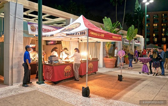 The Smokin' D's BBQ booth at the 2021 Swan and Dolphin Food and Wine Classic was near the pool area.