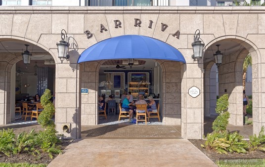 This photo of the front entrance at Bar Riva shows the various seating options... the main bar/lounge & ordering area at the very back has a few stools at the bar, and the other "table based" seating options are in front of and off to the left-hand side of the the main entrance. All are very well covered in case of rain.