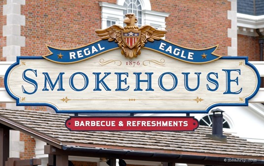 This is the courtyard entrance sign for the Regal Eagle Smokehouse. The "Eagle" on the sign, is "Sam Eagle" ... from the Muppets.