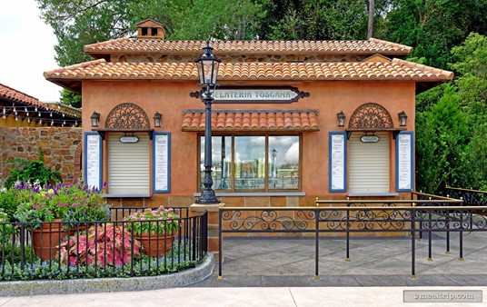 The Gelateria Toscana shop is located between the American and Italian Pavilions at Epcot. The building and immediate surrounding area has a slightly modern countryside feel — as opposed to the 
central courtyard area in the Italy Pavilion, which features more of an old world "classic" Italian theme.