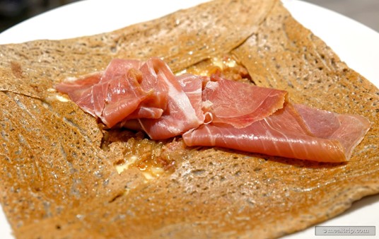 The prosciutto ham on top of La Crêperie de Paris' "Savoyarde" Galette seems a little out of place to me... maybe a little more Italian or Spain, than French. Something like Jambon Sec de Corse would be more authentic. I guess "prosciutto" is a word that is more widely known.