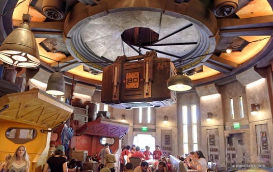 Ahhhh... I finally found some "cargo". It's a cool looking box. I really like the aperture style airlock at the top. This is all very authentic looking. I kind of wish this moved up and down out of that portal — kind of like Teddi Barra come out of the ceiling at the Country Bear Jamboree — but alas, it just sits there... motionless.