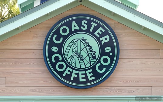 The sign above the Coaster Coffee Company is aqua and navy blue (presumably) to match the trim of the building. In most other locations (smaller signs and printed material), it's white and navy blue.