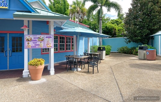 There's not much seating at Edy's Ice Cream Parlor. A couple of umbrella covered tables are on the right and left exterior of the location. Pictured here are the tables on the right side of the entrance doors. The tables on the left are in between the Coaster Coffee Company and Edy's Ice Cream Parlor — and are sometimes used by patrons of both locations.