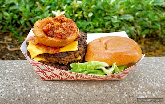 The Altitude Burger features one pound of beef, bacon, homemade chili, cheddar cheese onion rings and a special sauce.