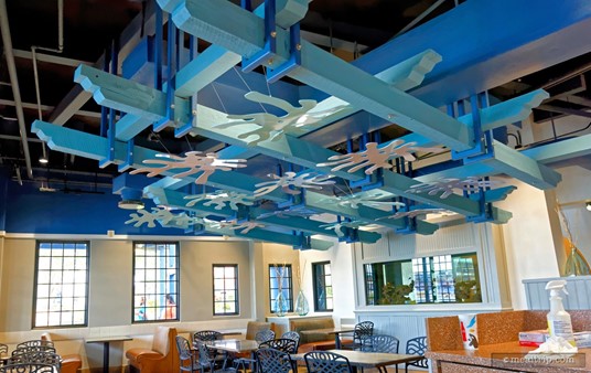 The wooden ceiling beams have been painted blue and adorned with... squiggly things... which are intended to make this room feel a little like dining in a fish tank. (It's more effective at night.) This room does offer a great view of the 600 gallon fish tank near the location's entrance.