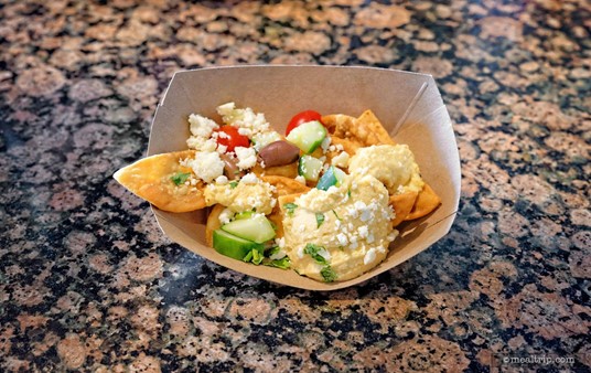 These are the Lakeside Mediterranean Nachos. They're said to feature pita chips with hummus, feta cheese, tomatoes, and olives. (Photo taken 2022.)