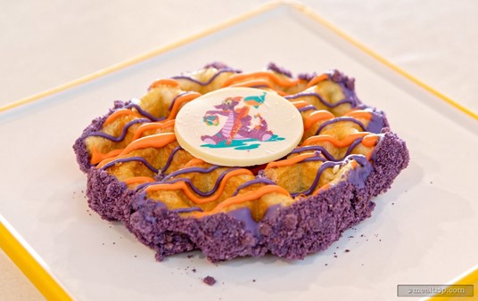 The white chocolate "coin" in the center of the waffle has a rendition of Figment printed on it using edible ink. The whole coin is edible.