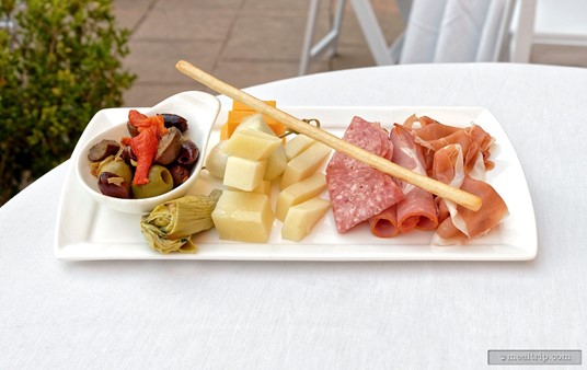 The VIP hors d'oeuvres plate is a antipasto plate full of Italian meat, cheese, and veggies.