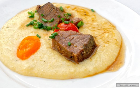 The Red Wine Braised Beef features braised beef in a pool of cheese polenta rustica, and was served with a couple pickled heirloom tomatoes and fresh chives.