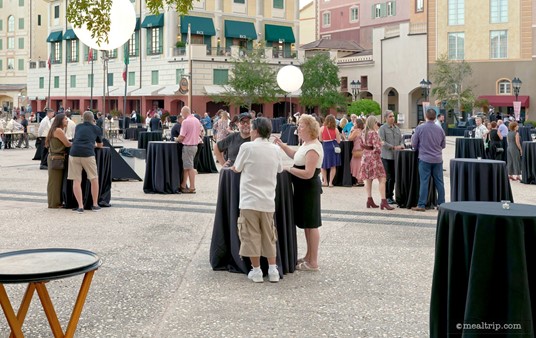 These high-boy tables in the Standing/Strolling Ticket area at Harbor Nights, are not really intended to be "held" by a party. The idea is, that guests will stroll around to the different food and wine stations, and stop briefly at the nearest table, before strolling to the next area.