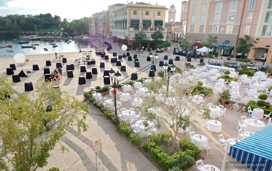 The Harbor Piazza is set up for Harbor Nights La Dolce Vita! The Standing/Strolling Ticket area is on the left in this photo (black tablecloths) and the VIP Ticket area is on the right (white tablecloths with chairs).