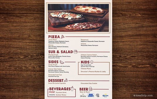 The Dockside Pizza Company menu board (photo taken early summer 2024).