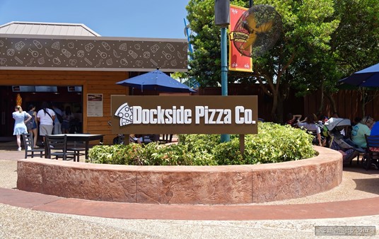 It's easy to find the Dockside Pizza Company... because there's a sign outside that reads, "Dockside Pizza Co.".