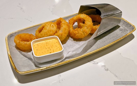 The Onion Rings are on the Appetizer part of the menu at Steakhouse 71 and are said to be hand-breaded and served with Spicy Ranch Dipping Sauce.