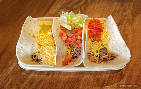 The taco-boat that the Street Tacos are served in does a nice job of holding the tacos open while you visit the toppings bar.