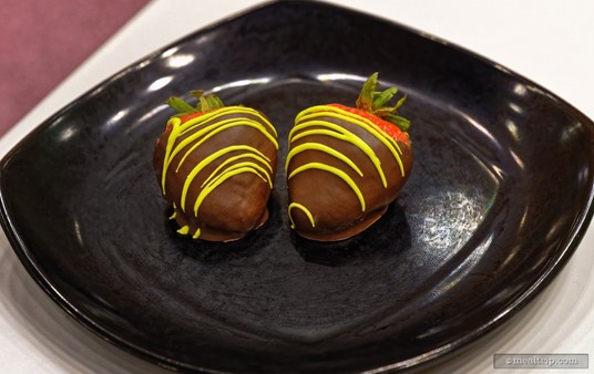 The Chocolate Dipped Strawberries (for me anyway) are one of the desserts I look forward to at any of the Disney Dessert Parties. It's a great flavor combo and they always use juicy, "two-bite" sized strawberries to dip in that chocolate. They also have green "white chocolate" drizzle, which is the Halloween design twist.
