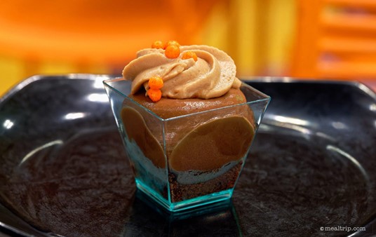 The Devil's Chocolate Pudding cup combines a layer of chocolate crumbles with a milk chocolate mousse and a caramel mousse with a couple of orange crispy pearls.