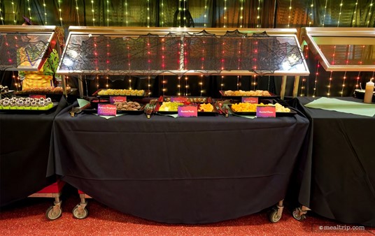 Here's a look at one of the buffet tables at Disney's Not-So-Spooky Spectacular Dessert Party. There's around 6 items on each of the tables. Most of the items have name tags and tongs for grabbing the items.