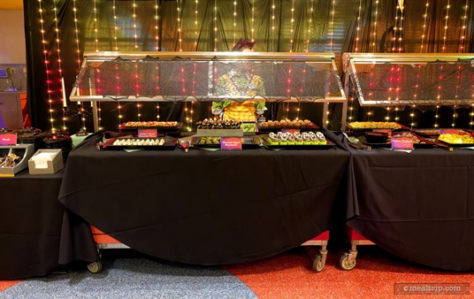 Here's a look at another one of the buffet tables. There's six items on this table as well, but not all of them have name tags. On the night I went, three of the items were new to the dessert party, and the attendant said they didn't have name tags yet. She told me what the unnamed desserts were though.