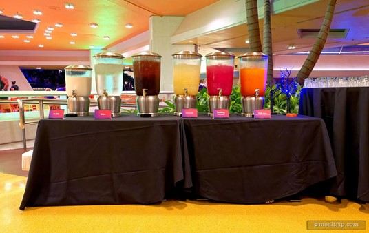 There's quite a few juice options at the party. From left to right there's Milk, Water, Tea, Lemonade, Raspberry Lemonade, and POG Juice. (There's quite a few Disney POG Juice fans out there.)