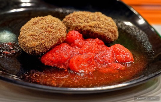 These Firehouse Doughnuts (made with ricotta cheese) are covered in sugar and cinnamon, and are paired with a strawberry sauce — that you don't have to put on a plate like this if you don't want to... the sauce is optional. It seemed like it would make for a good photo at the time — but the sauce is a little sloshy.