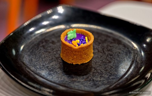 This is a Key Lime Tart cup from the dessert buffet line at Disney's Not-So-Spooky Spectacular Dessert Party.