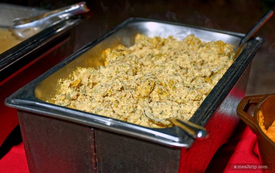 This is supposed to be Corn Bread Stuffing. It's next to the Turkey with Gravy on one of the buffet lines at Dinner with Santa at SeaWorld.