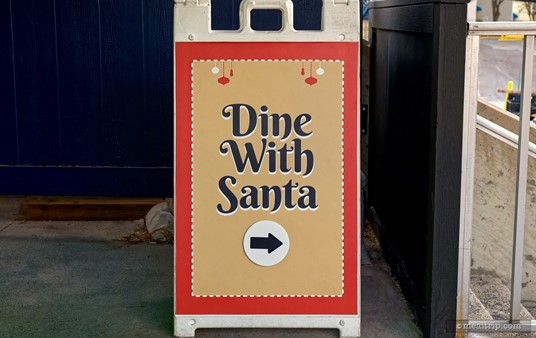 I'm thinking ... in order to fit "Dinner" on one line, they would have had to make the font smaller — so they went with "Dine with Santa" instead. Or perhaps, there was a "Halftime Tailgate with Santa" at some point — and rather than create two different signs — they just went with "Dine with Santa" which technically, would cover both events. It's probably the former, but it might be the latter... maybe.