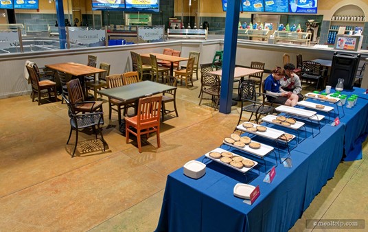 Here's the basic layout of the cookie and beverage buffet tables. While guests are expected to enjoy their cookies out on the patio while waiting for the fireworks, the cookie and beverage tables are set up inside one small area of the Lakeside Grill Cantina (which is closed and no longer serving food by the time the holiday cookie party starts).