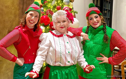 The special guests at the "Cookies, Cocoa, & Milk Party Featuring a Special Holiday Guest" were Mrs. Claus and two elves, Ren (left) and Kirby (right).