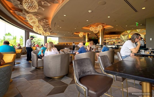 Here's another photo that shows the full length of the lounge seating area. There are some cool Q*Bert style tiles on the floor – but it's not something that really draws too much attention when you're there. 