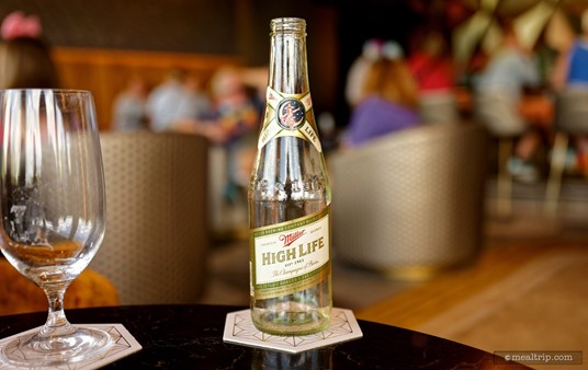 And this is what an empty beer bottle looks like at Geo-82. The beer at Geo-82 is the least expensive beverage type on the menu, and it really doesn't cost more here, than at any of the other Disney lounges that you could order a beer from.