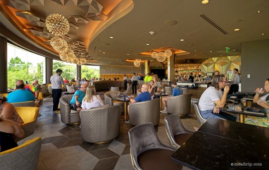 Yay! I found the perfect "hidden Mickey in the light fixutre" photo location. If you're sitting at one of the half-booth, half-chair tables at the far end of the room – the center light fixture closest to the bar looks like a hidden Mickey!